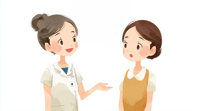 介護職員が新人職員にやさしく声をかけ、コミュニケーションをとっている様子のイラスト